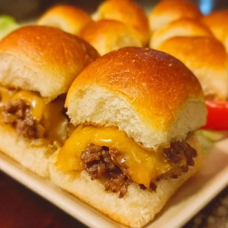 Plate of homemade cheeseburger sliders with toppings