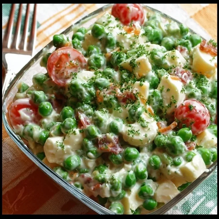 Paula Deen's vibrant green pea salad with fresh ingredients served in a bowl.
